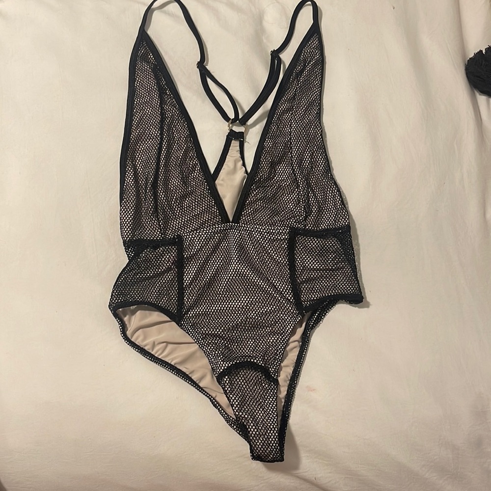 Eastnwest label one piece